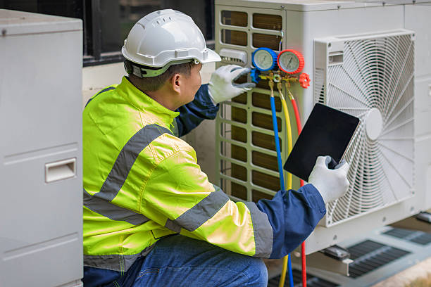 Professional Air Duct Cleaning technician working in Van Buren, AR
